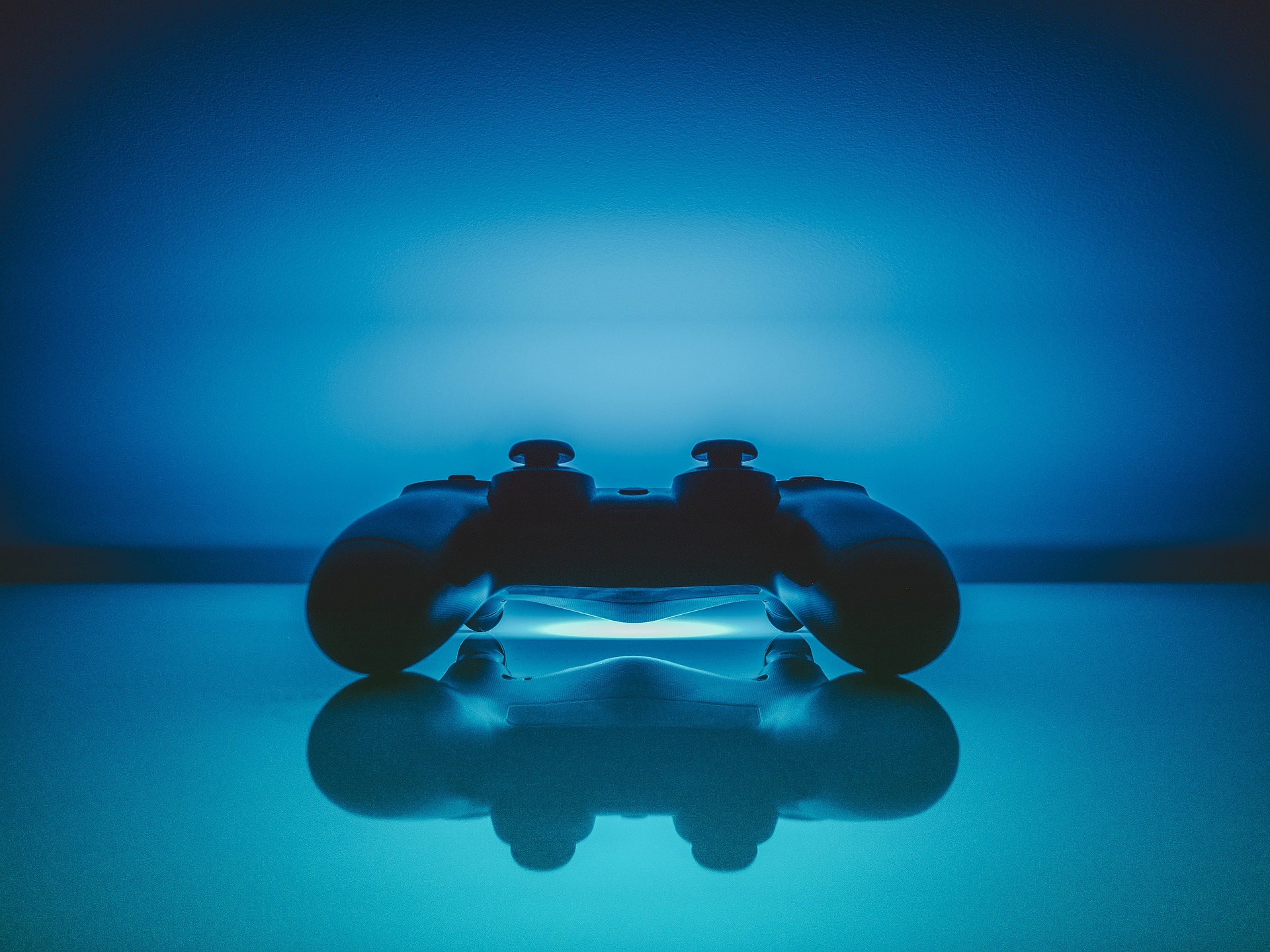 Modern gaming controller with blue lighting